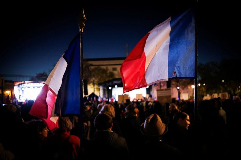 Thousands gather in Paris suburb to pay tribute to shooting victims